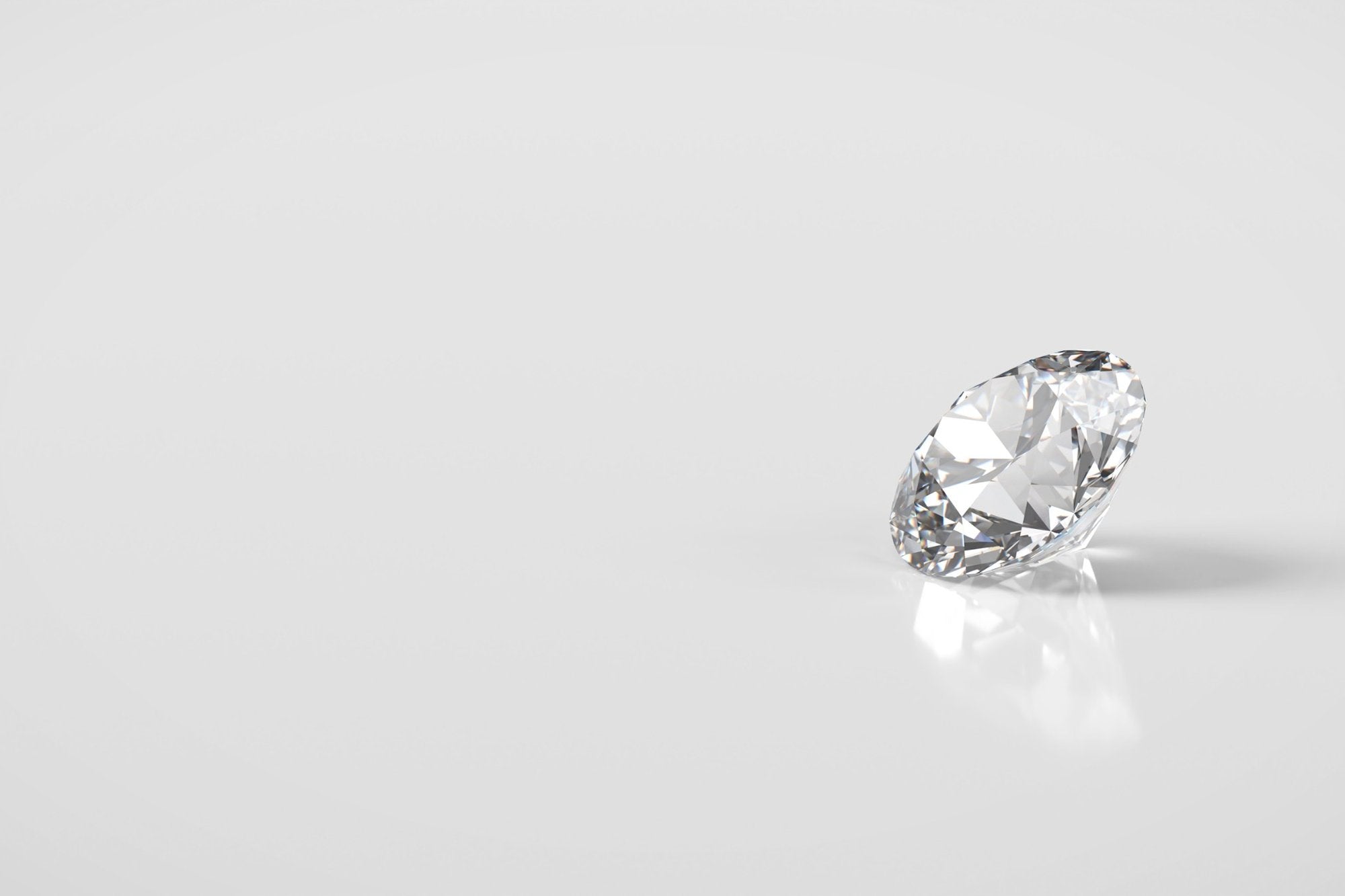 FacetsN lab-grown diamond stone on white surface