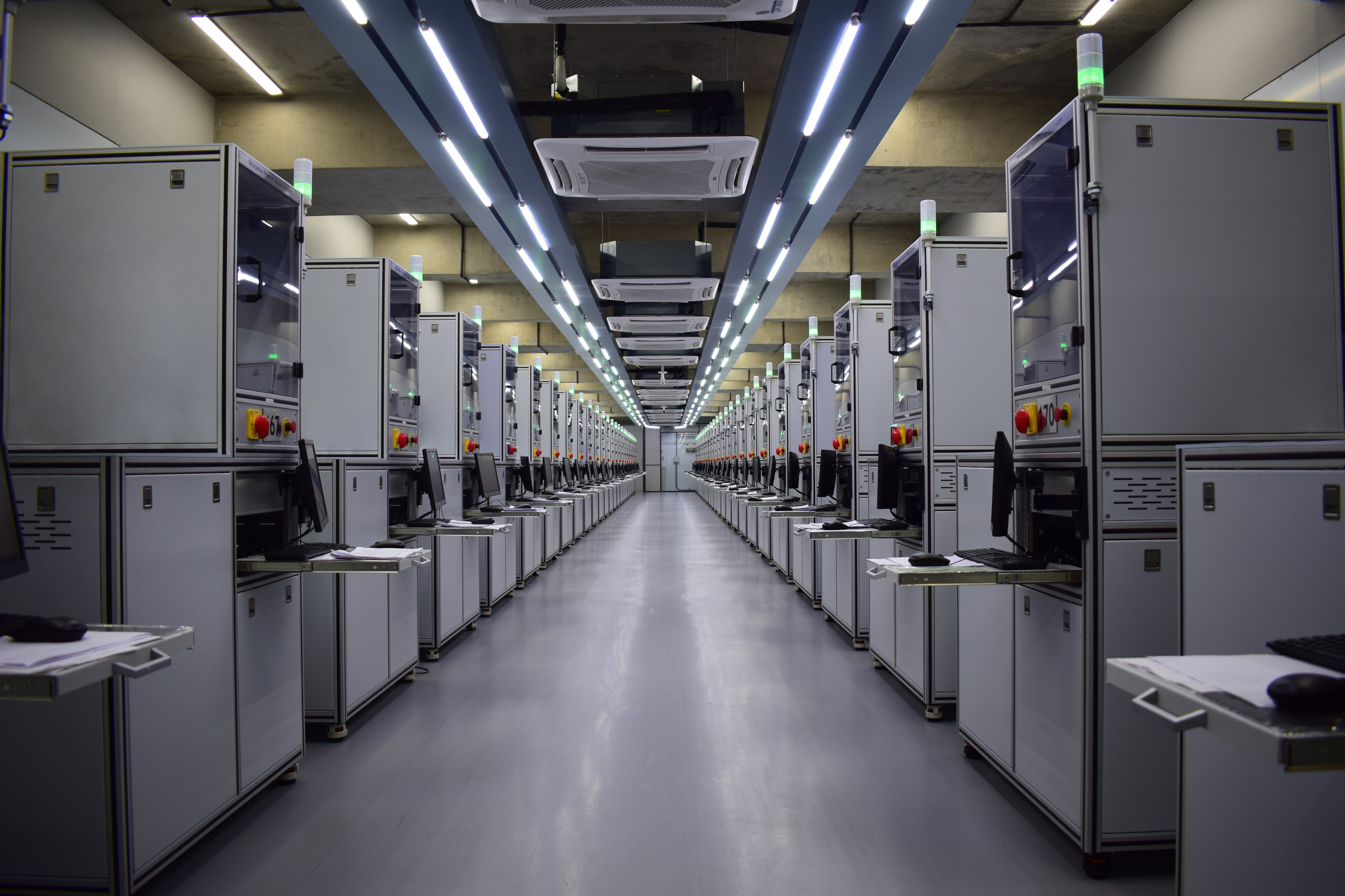 row of CVD diamond growth reactors in a high-tech lab facility